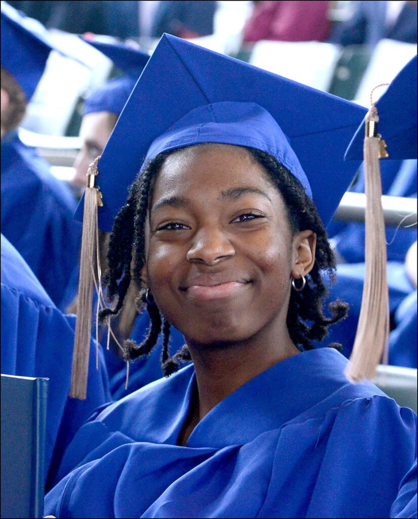 Photo of woman in cap and gown